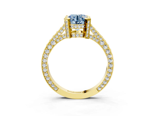 Yellow gold Fancy Blue Round Cut Brilliant Split Shank Pave Solitaire Ring with Four-Prong Setting