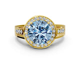 Yellow gold Fancy Blue Round Cut Diamond Halo Ring with Split Shank and Bezel Accents and Prong Setting