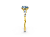 Yellow gold Fancy Blue Round  Cut Diamond Ring with Baguette Side Stones, Channel Set Band, and Four-Prong Setting_38