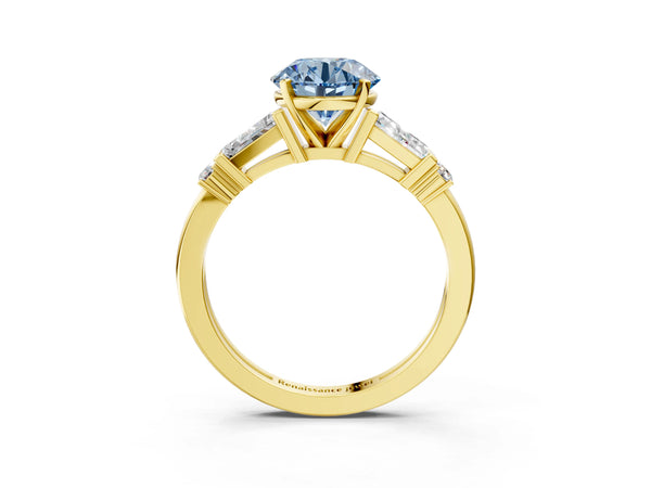 Yellow gold Fancy Blue Round  Cut Diamond Ring with Baguette Side Stones, Channel Set Band, and Four-Prong Setting