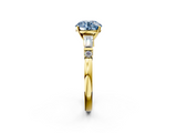 Yellow gold Fancy Blue Round  Cut Diamond Ring with Baguette Side Stones, Channel Set Band, and Four-Prong Setting_5