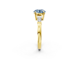 Yellow gold Fancy Blue Round  Cut Diamond Ring with Tapered Baguette Side Stones in Four-Prong Setting_5