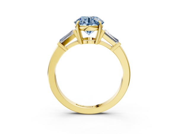 Yellow gold Fancy Blue Round  Cut Diamond Ring with Tapered Baguette Side Stones in Four-Prong Setting