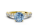 Yellow gold Fancy Blue Round Cut Diamond Solitaire Ring with Shared Prong Pavé Band and Four-Prong Setting_57