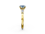 Yellow gold Fancy Blue Round  Cut Diamond Solitaire Ring with Tapered Baguette Accents and Four-Prong Setting_48