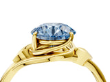 Yellow gold Fancy Blue Round Cut Diamond Solitaire Ring with Twist Band and Four-Prong Setting_114