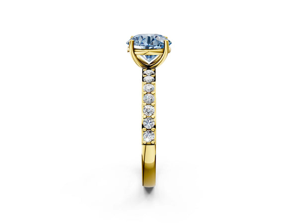 Yellow gold Fancy Blue Round  Cut Diamond Solitaire with Pave Band and Four-Prong Setting