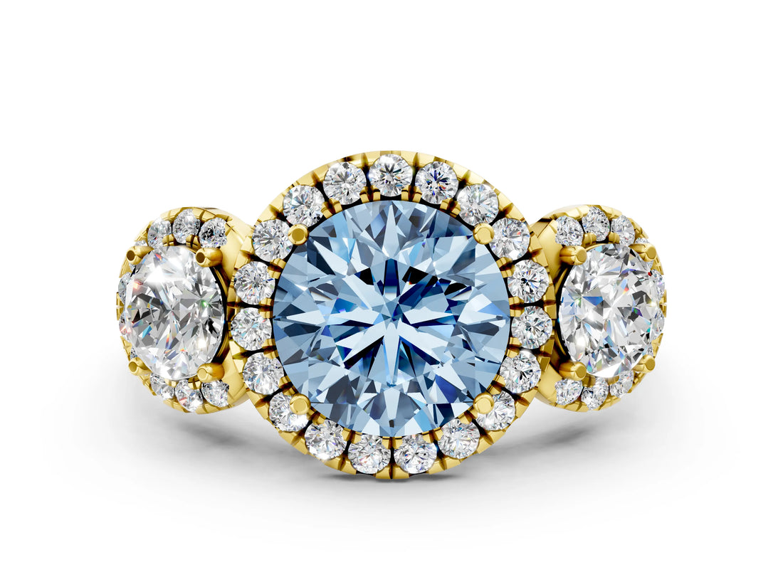 Yellow gold Fancy Blue Round Cut Diamond Three-Stone Halo Ring with Prong Setting and Pavé Accents