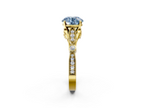 Yellow gold Fancy Blue Round  Cut Diamond with Milgrain Marquise and Bezel Accents on a Solitaire Band with Prong Setting_175