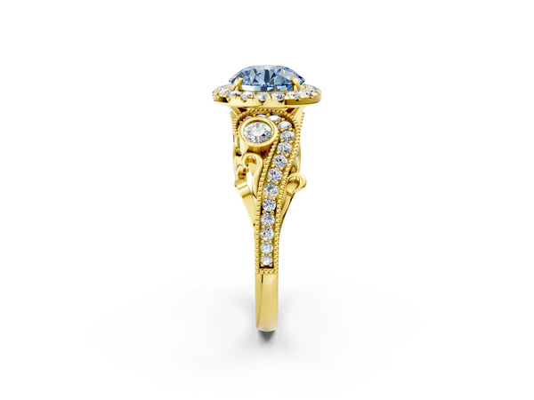 Yellow gold Fancy Blue Round Cut Halo Diamond Ring with Milgrain and Bezel Accents on a Split Shank Band