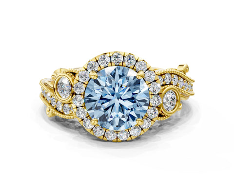 Yellow gold Fancy Blue Round Cut Halo Diamond Ring with Milgrain and Bezel Accents on a Split Shank Band