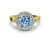 Yellow gold Fancy Blue Round Cut Halo Round Diamond Twist Band with Four-Prong Setting