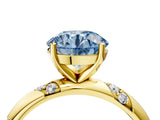Yellow gold Fancy Blue Round Cut Solitaire Diamond Engagement Ring with Twisted Pave Band and Four-Prong Setting_7