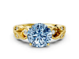 Yellow gold Fancy Blue Round Cut Solitaire Milgrain Leaf Band with Prong Setting
