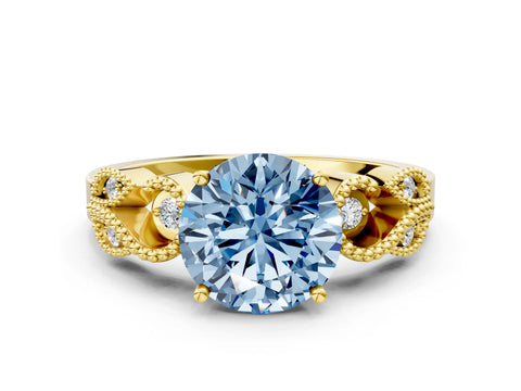 Yellow gold Fancy Blue Round Cut Solitaire Milgrain Leaf Band with Prong Setting