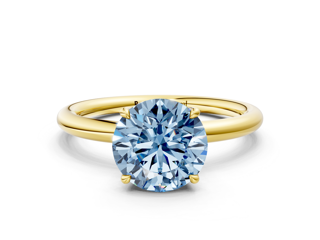 Yellow gold Fancy Blue Round  Cut Solitaire Ring with Thin Band and Four-Prong Setting_16