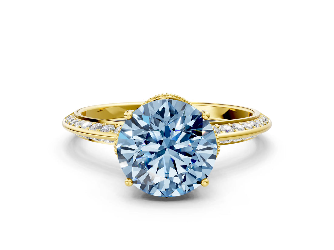 Yellow gold Fancy Blue Round Cut Solitaire Split Shank Pave Diamond Engagement Ring with Four-Prong Setting