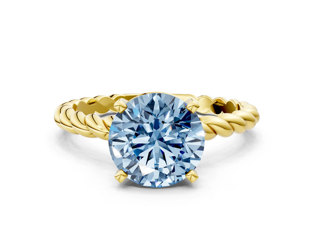 Yellow gold Fancy Blue Round  Cut Solitaire Twisted Band with Four-Prong Setting_52