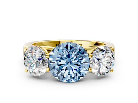 Yellow gold Fancy Blue Round Cut Three-Stone Diamond Ring with Prong Setting on a Classic Band
