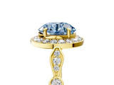 Yellow gold Fancy Blue Round  Halo Diamond Engagement Ring with Twisted Band and Four-Prong Setting