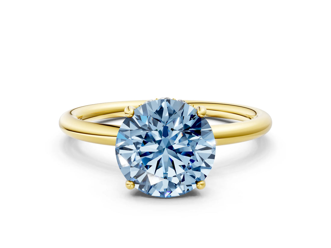 Yellow gold Fancy Blue Round  Solitaire Diamond Ring with a Classic Band and Four-Prong Setting 1