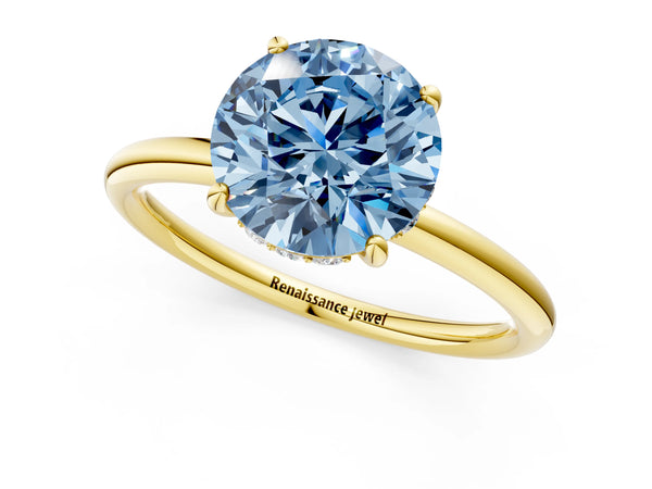 Yellow gold Fancy Blue Round  Solitaire Diamond Ring with a Classic Band and Four-Prong Setting