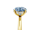 Yellow gold Fancy Blue Round  Solitaire Diamond Ring with a Classic Band and Four-Prong Setting