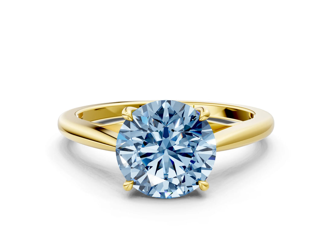 Yellow gold Fancy Blue Round  Solitaire Engagement Ring with Four-Prong Setting and Classic Band