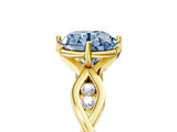 Yellow gold Fancy Blue Round  Solitaire Twist Band with Leaf Prong Setting