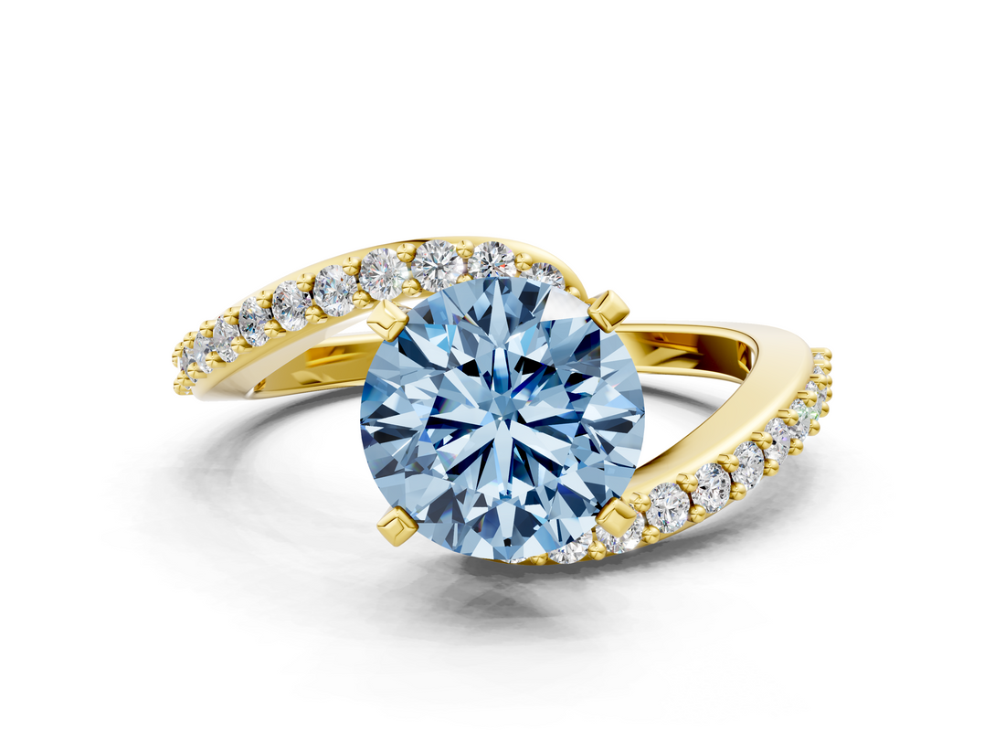 Yellow gold Fancy Blue Round  Solitaire Twist Band with Pave Set Diamonds and Four-Prong Setting_110