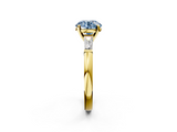 Yellow gold Fancy Blue Round  Solitaire with Tapered Baguette Side Stones on a Classic Band with Four-Prong Setting_93