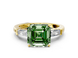 Yellow gold Fancy Green Asscher  Solitaire with Tapered Baguette Side Stones on a Classic Band with Four-Prong Setting