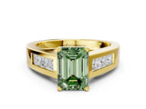 Yellow gold Fancy Green Emerald Cut Cut Channel Set Solitaire Ring with Four-Prong Setting