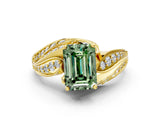 Yellow gold Fancy Green Emerald Cut Diamond Solitaire Ring with Prong Setting and Twisted Pavé Band