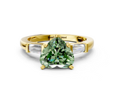 Yellow gold Fancy Green Heart  Cut Diamond Solitaire Ring with Tapered Baguette Accents and Four-Prong Setting