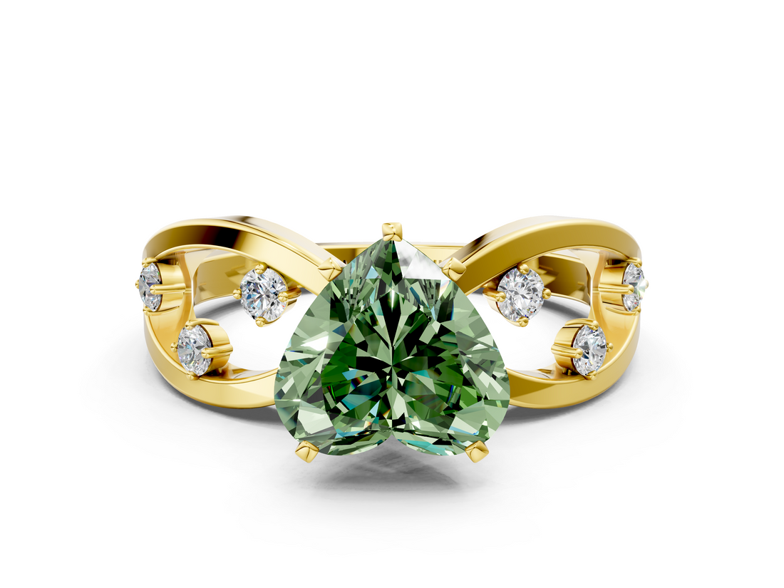 Yellow gold Fancy Green Heart  Cut Solitaire Diamond with Side Stones on Criss-Cross Band and Four-Prong Setting