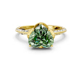 Yellow gold Fancy Green Heart Cut Solitaire Split Shank Pave Diamond Engagement Ring with Four-Prong Setting