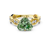 Yellow gold Fancy Green Heart  Solitaire Twist Band with Leaf Prong Setting