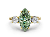 Yellow gold Fancy Green Marquise Cut Diamond Three-Stone Engagement Ring with Prong Setting and Pavé Band