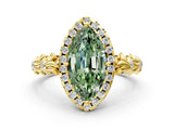 Yellow gold Fancy Green Marquise Cut Halo Diamond Solitaire with Filigree Band and Four-Prong Setting