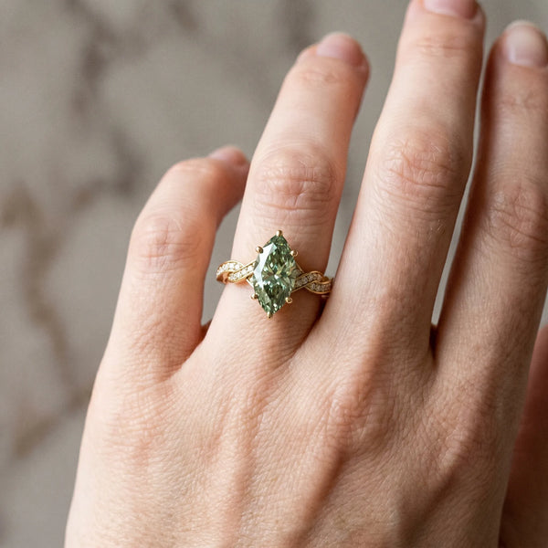 Yellow gold Fancy Green Marquise  Cut Twisted Pavé Band Solitaire Ring with Four-Prong Setting