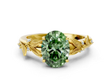Yellow gold Fancy Green Oval  Brilliant Solitaire with Leaf Motif Band and Four-Prong Setting_61