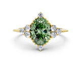 Yellow gold Fancy Green Oval Cut Brilliant Diamond with Cluster Setting on a Beaded Band and Four-Prong Setting
