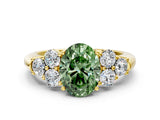 Yellow gold Fancy Green Oval  Cut Diamond Cluster Ring with Round Accent Stones and Prong Setting on a Classic Band_49