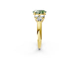 Yellow gold Fancy Green Oval  Cut Diamond Cluster Ring with Round Accent Stones and Prong Setting on a Classic Band_51