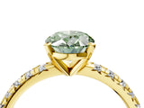 Yellow gold Fancy Green Oval Cut Diamond Solitaire Pavé Engagement Ring with Round Band and Prong Setting_66