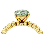 Yellow gold Fancy Green Oval Cut Diamond Solitaire Ring with Beaded Band and Prong Setting_299