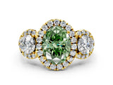 Yellow gold Fancy Green Oval Cut Diamond Three-Stone Halo Ring with Prong Setting and Pavé Accents