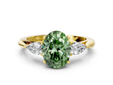 Yellow gold Fancy Green Oval Cut Diamond Three-Stone Ring with Pear Side Stones and Four-Prong Setting_83