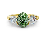 Yellow gold Fancy Green Oval Cut Diamond Three-Stone Ring with Prong Setting and Pavé Band